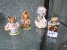 Four Beswick Beatrix Potter figures Mrs Title mouse,Thomasina Tittle mouse, Lady mouse, Mr Jackson.
