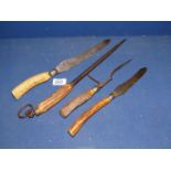 A four piece Carving set having antler handles by Joseph Rogers?**