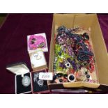 A box of mixed items of costume jewellery including beaded necklaces, earrings, Kings,