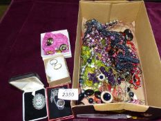 A box of mixed items of costume jewellery including beaded necklaces, earrings, Kings,
