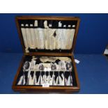 A Mahogany cased Canteen of Cutlery.