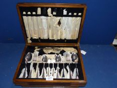 A Mahogany cased Canteen of Cutlery.