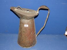 A large Copper jug with a hinged lid. 16" tall.