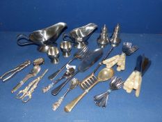 A quantity of cutlery including pastry forks, grape scissors, bread tongs, fish eaters etc,