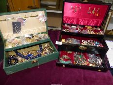 Two jewellery boxes with costume jewellery.