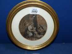 A circular framed and mounted Charcoal picture depicting a classical scene with women and children.