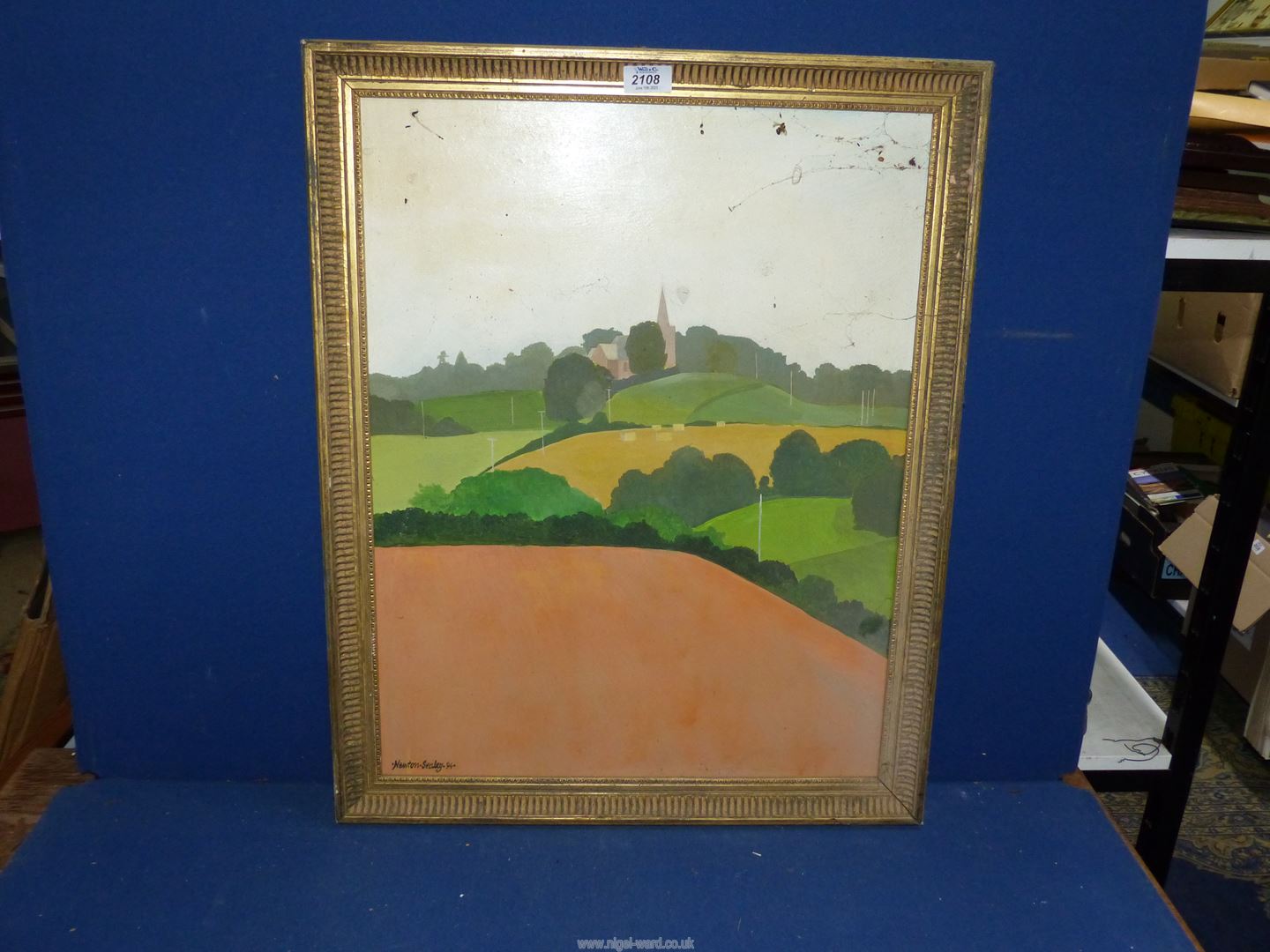 A large Oil on board depicting a country landscape, signed lower left 'Newton-Sealy'. 21" x 26 3/4".