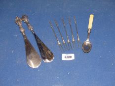 Two silver handled Shoehorns with Birmingham hallmarks,