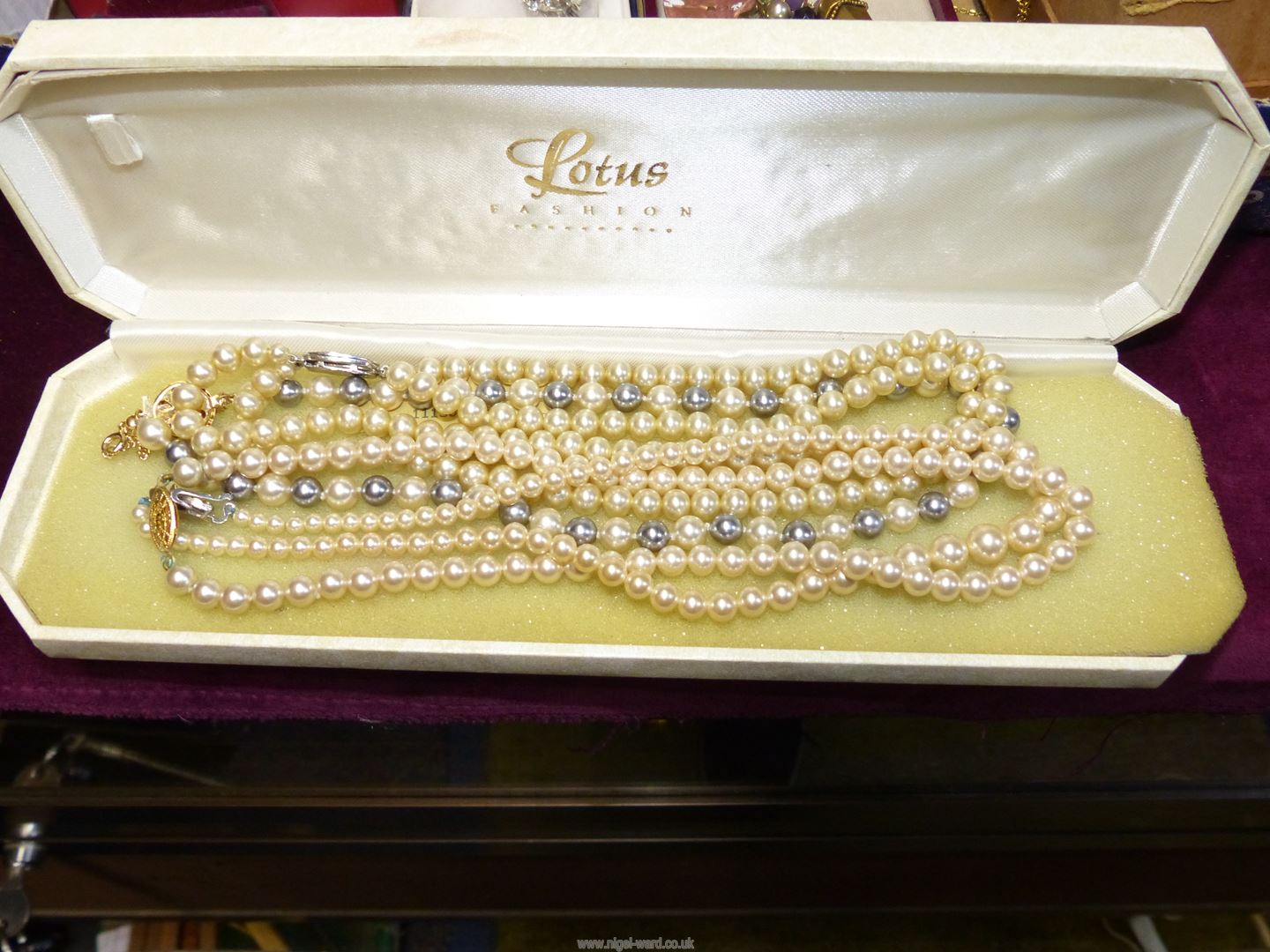 A quantity of costume jewellery in a jewellery box including simulated pearls, earrings, necklaces, - Image 2 of 4