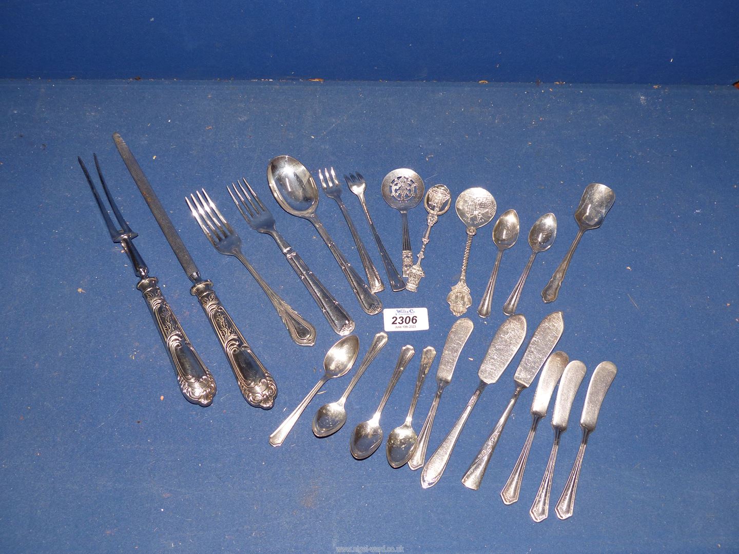 A small quantity of cutlery including carving fork and steel, six teaspoons, jam spoon,