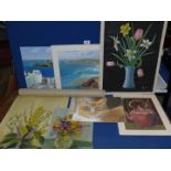 A small case containing unframed paintings to include still life by B. Thomas, seascapes by P.