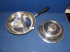 A large Victorian silver plated serving pan with wood handle and three internal compartments by