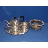 A Georgian silver plated on copper Champagne Holder and a silver plated three piece tea service