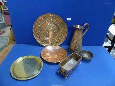 Five brass and copper items to include charger, ale jug and jardiniere, etc.