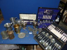 A quantity of plated and pewter items including cased fish servers, cutlery tankards, napkin rings,