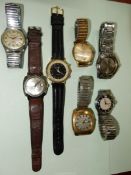 Seven gentleman's wristwatches with clockwork movements including Saxon 17 jewels black face and