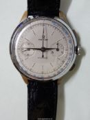 An elegant "Revue Antimagnetic" clockwork gent's Wristwatch having a champagne coloured face with