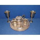 A quantity of plated items including teapot, sugar bowl, milk jug, salt cellar,