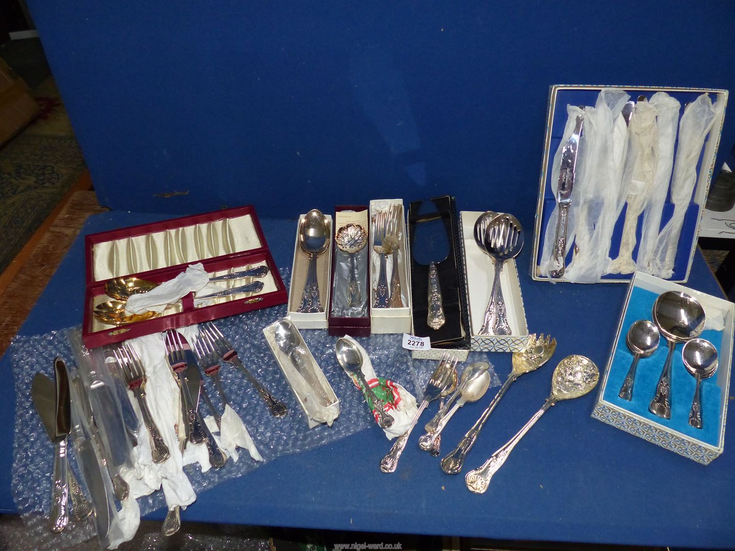 A good quantity of cutlery including knives, forks, serving spoons etc.