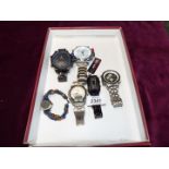 Six wristwatches including; Timex 'Ironbru' Indiglo, a black Binary watch, Accurist, Weide,