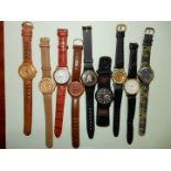 Nine quartz movement Watches including "K.E.