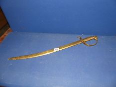 A heavy brass model of a sword, 28" long.