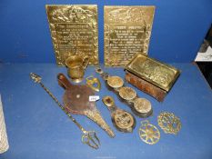 A small crate of brass items including plaques, horse brasses, tankard etc.