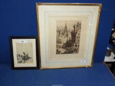 A framed and mounted Etching depicting a busy river scene with barges and figures and a town with a