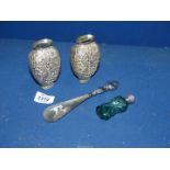 Two small white metal vases and scent bottle having green glass with silver top (unmarked,