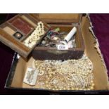 A brown leather jewellery box and contents of cufflinks, wristwatches, buttons, beads etc.