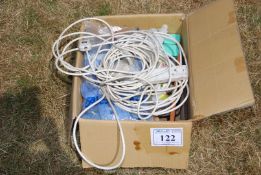 A quantity of extension leads, children's toys, etc.