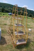 A moveable 4 ' step ladder.