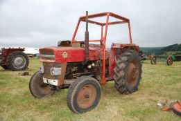 A Massey Ferguson 135 Diesel engined farm tractor with wishbone type front axle,