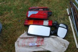 Quantity of rear lights and lorry mirrors.