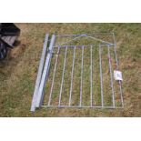 A galvanised garden gate with hanging post, 80" wide x 391/2" tall.