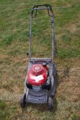 A Honda HRB 425C lawn mower with roller, no grass collector (engine turns - bit stiff).