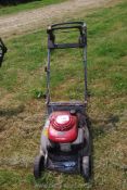 A Honda HRB475 petrol engined lawn mower with rear roller, no grass collector, good compression.