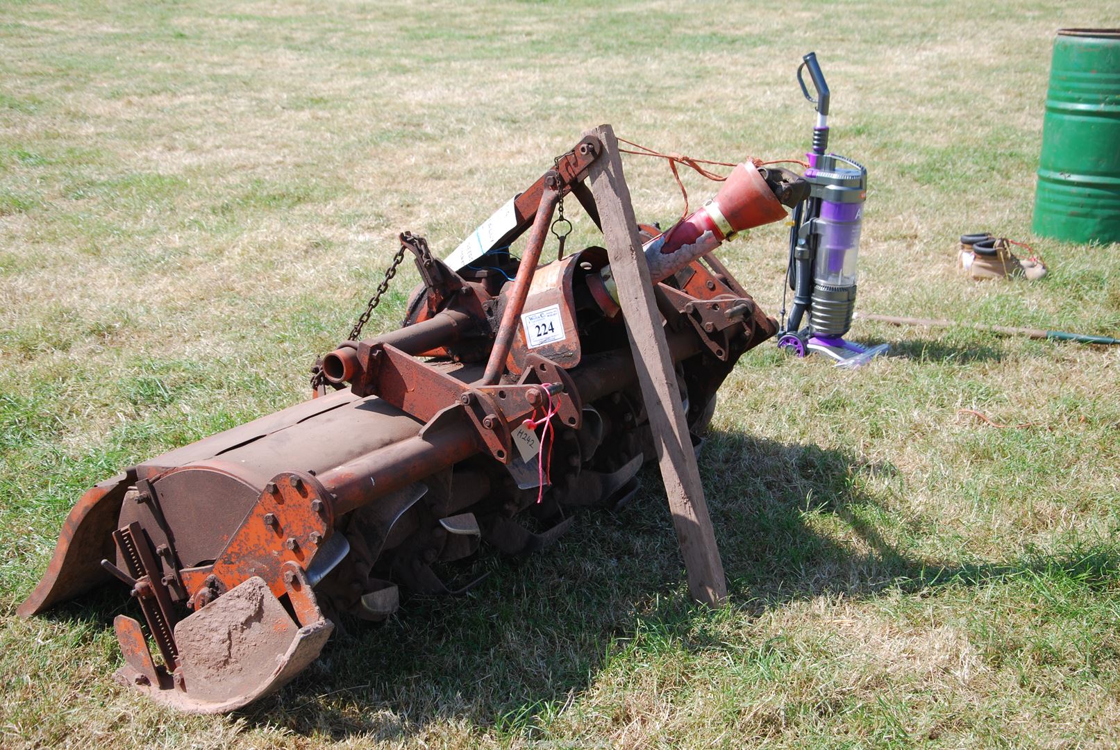 A hydraulic arm mounting Howard Rotavator 60" wide with Selectatilth gearing.