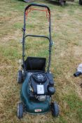 A Webb DVO130 132cc lawn mower with grass collector (engine turns).
