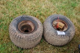 A pair of 4 stud fixing wheels and tyres for a quad trailer, (a/f).