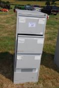 A four drawer filing cabinet.