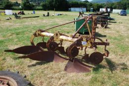 A Bamford's three-furrow conventional plough.