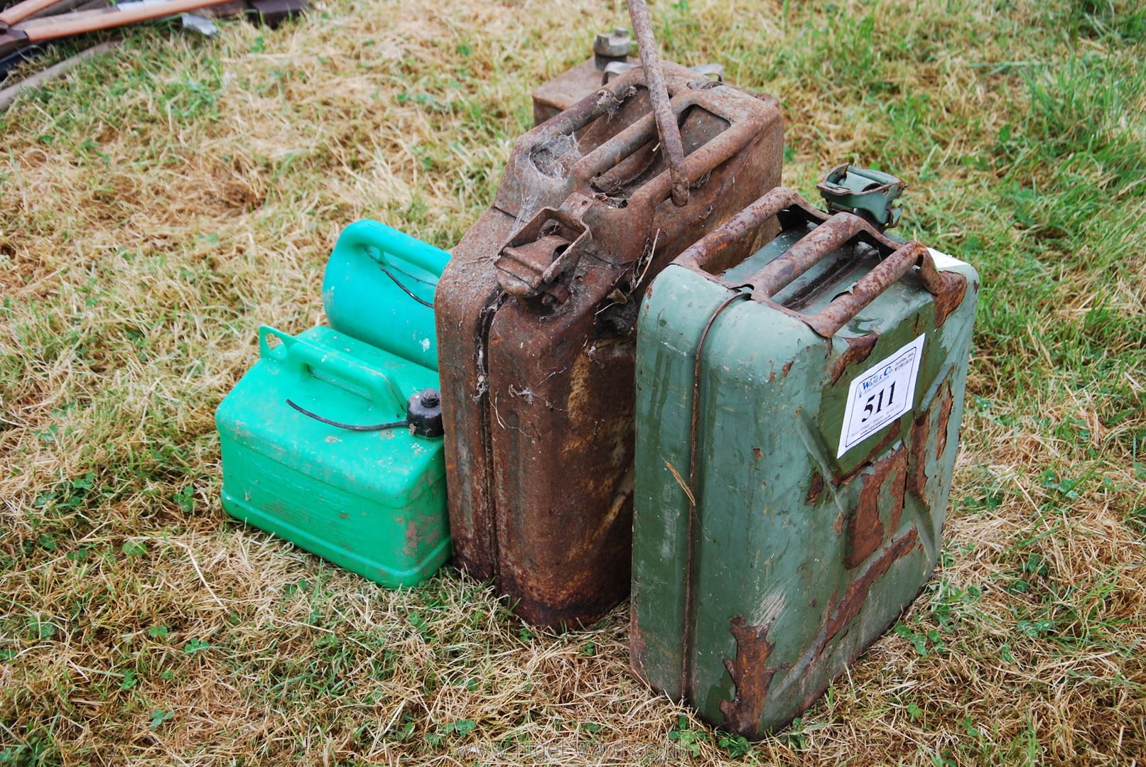 A quantity of jerry cans including Pratt's with brass Shell cap, etc.