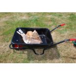 A new black "Chillington" Wheelbarrow, kindly donated by Pontrilas Builders Merchants and contents.