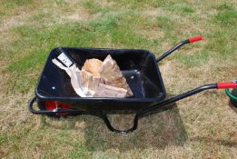 A new black "Chillington" Wheelbarrow, kindly donated by Pontrilas Builders Merchants and contents.