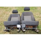 Two Ford heated front seats.