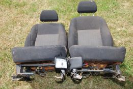 Two Ford heated front seats.