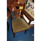 **An Upholstered Dining Chair.