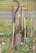 A quantity of garden tools, spades, forks, hedging bill, etc.