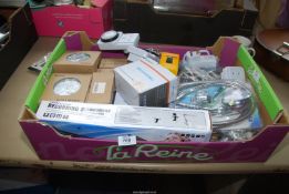 A box of electrical items including various timers and heating timers, clocks, alarm clocks etc.